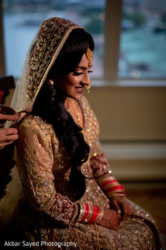 Stunning maharani being helped with the sari Stunning maharani being helped with the sari