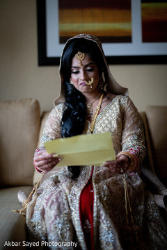 Beautiful maharani reads a letter while she prepares for the ceremony Beautiful maharani reads a letter while she prepares for the ceremony