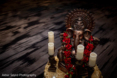 Image of Ganesha decorated with candles Image of Ganesha decorated with candles