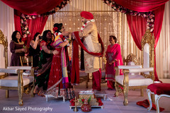 Indian wedding rituals continue under the beautiful mandap Indian wedding rituals continue under the beautiful mandap