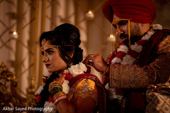Raja placing the flower garland over the beautiful maharani Raja placing the flower garland over the beautiful maharani