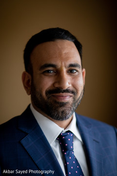 Portrait of the elegant Indian groom before the reception Portrait of the elegant Indian groom before the reception