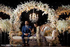 Indian newlyweds under the amazing flower and light decoration Indian newlyweds under the amazing flower and light decoration