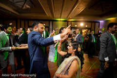 Indian newlyweds enjoying the music at the dance floor Indian newlyweds enjoying the music at the dance floor
