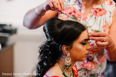 Maharani being assisted with the traditional Tikka Maharani being assisted with the traditional Tikka