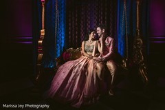 Enchanting shot of the Indian couple wearing the sari and sherwani Enchanting shot of the Indian couple wearing the sari and sherwani