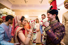 Maharani and Raja holding the flower garland during the ceremony Maharani and Raja holding the flower garland during the ceremony