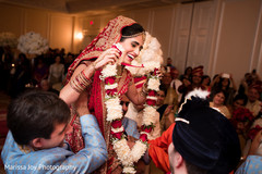 Beautiful maharani is lifted by guests during a moment of the ceremony Beautiful maharani is lifted by guests during a moment of the ceremony