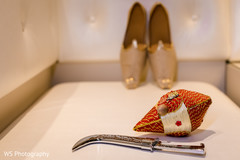 Majestic Indian groom's dagger, wedding shoes. Majestic Indian groom's dagger, wedding shoes.