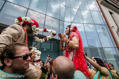 Indian bride putting garland to groom. Indian bride putting garland to groom.