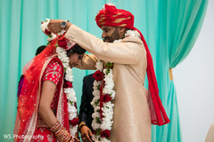 Indian bride and groom at their Jaimala Ceremony. Indian bride and groom at their Jaimala Ceremony.