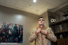 Enchanting groom getting ready for wedding ceremony. Enchanting groom getting ready for wedding ceremony.