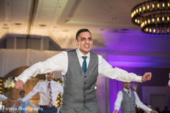 Charming Indian grooms dance. Charming Indian grooms dance.