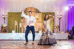 Indian wedding guests performing a dance. Indian wedding guests performing a dance.