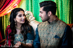 Indian bride and groom at mehndi party capture. Indian bride and groom at mehndi party capture.