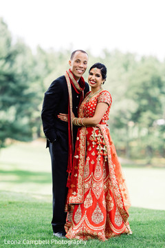 Lovely capture of the Indian bride and groom during the photo shoot Lovely capture of the Indian bride and groom during the photo shoot