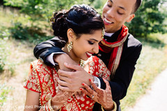 Indian groom holds the beautiful maharani before the ceremonies Indian groom holds the beautiful maharani before the ceremonies
