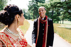 Indian groom stares at the beautiful maharani during the photo shoot Indian groom stares at the beautiful maharani during the photo shoot