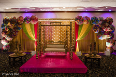 Colorful Indian sangeet swinging seat on stage. Colorful Indian sangeet swinging seat on stage.