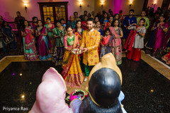 Indian bride and groom at sangeet ritual. Indian bride and groom at sangeet ritual.