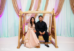 Lovely indian couple sitting in a jhula Lovely indian couple sitting in a jhula