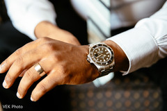 Indian groom getting his jewelry on. Indian groom getting his jewelry on.