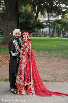 Adorable indian bride posing with groom Adorable indian bride posing with groom