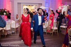 Indian newlyweds making their reception entrance