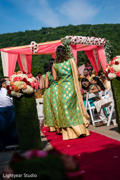 Gorgeous Indian bridesmaids walking in the wedding aisle. Gorgeous Indian bridesmaids walking in the wedding aisle.