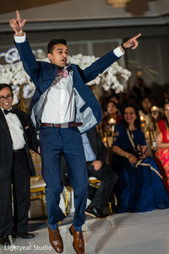 Joyful indian wedding guests dancing. Joyful indian wedding guests dancing.