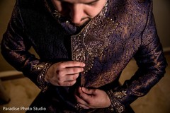 Detail of the elegant sherwani used by the raja Detail of the elegant sherwani used by the raja