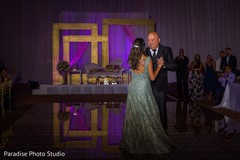 Beautiful maharani dancing with family during the reception Beautiful maharani dancing with family during the reception