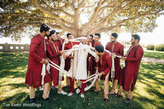 Charming indian groom with groomsmen Charming indian groom with groomsmen