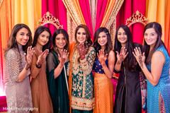 Maharani and bridesmaids showing their mehndi art. Maharani and bridesmaids showing their mehndi art.