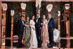 Elegant Indian bride and groom's with parents capture. Elegant Indian bride and groom's with parents capture.