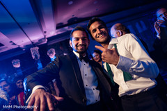 Upbeat Indian guest and groom capture. Upbeat Indian guest and groom capture.