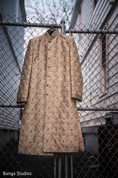 Regal Indian groom's sherwani capture. Regal Indian groom's sherwani capture.