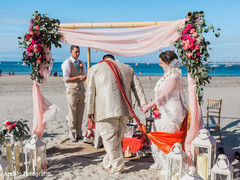 Indian bride and groom walking around sacred fire. Indian bride and groom walking around sacred fire.