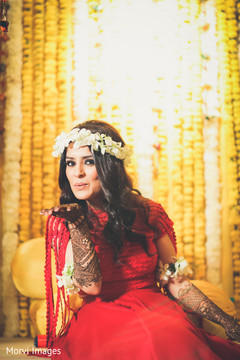 Enchanting indian bride during mehndi celebration. Enchanting indian bride during mehndi celebration.
