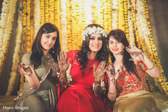 Indian bride and bridesmaids showing mehndi art. Indian bride and bridesmaids showing mehndi art.