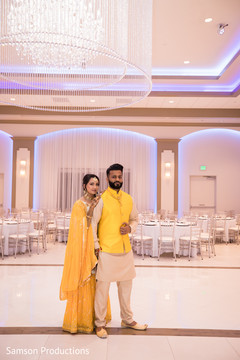 Enchanting indian couple during sangeet celebration Enchanting indian couple during sangeet celebration