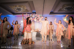 Indian newlyweds and guests performing a choreography Indian newlyweds and guests performing a choreography