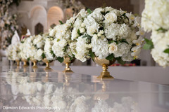 Elegant flower arrangements at the Indian wedding venue Elegant flower arrangements at the Indian wedding venue