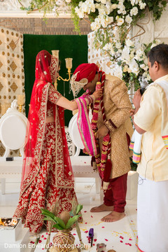 Maharani placing the flower garland on Raja during the ceremony Maharani placing the flower garland on Raja during the ceremony