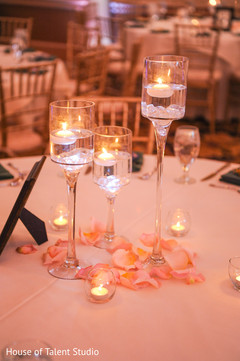 Unique Indian wedding reception table centerpiece. Unique Indian wedding reception table centerpiece.