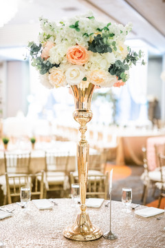 Unique Indian wedding reception table centerpiece. Unique Indian wedding reception table centerpiece.