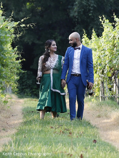 Charming Indian bride and groom holding hands. Charming Indian bride and groom holding hands.