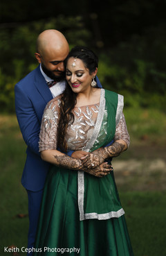 Elegant Indian bride and groom posing for photo shoot. Elegant Indian bride and groom posing for photo shoot.