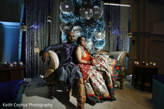 Elegant Indian newlyweds pose at the venue Elegant Indian newlyweds pose at the venue