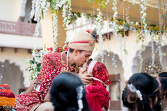 Indian groom kissing the beautiful Indian bride Indian groom kissing the beautiful Indian bride